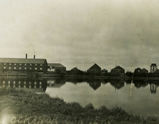 The Libby, McNeill and Libby cannery at Lockanok was built in 1900 at the mouth of the Alagnak River by the North Alaska Salmon Company from San Francisco. The cannery reportedly burned in 1937. Photo circa 1920-1930.