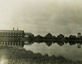 The Libby, McNeill and Libby cannery at Lockanok was built in 1900 at the mouth of the Alagnak River by the North Alaska Salmon Company from San Francisco. The cannery reportedly burned in 1937. Photo circa 1920-1930.